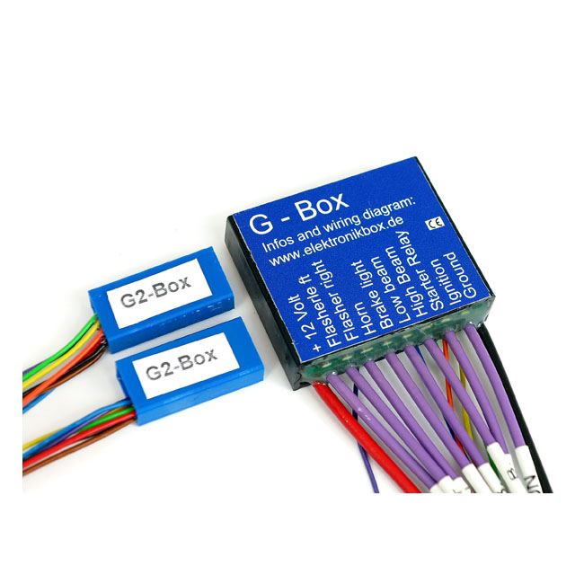 Axel Joost Elektronik, brain box G2 - on-bike programmable through 6 menu items with taillight/brake light, pushbutton or switch for head light, various flasher controls and flasher 'running light' mode. With 'status' LEDs on wiring exits. Dimensions: 50 - Hogparts UK